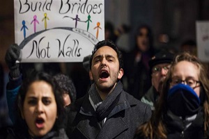 Seattle judge blocks Trump's travel ban; White House to appeal