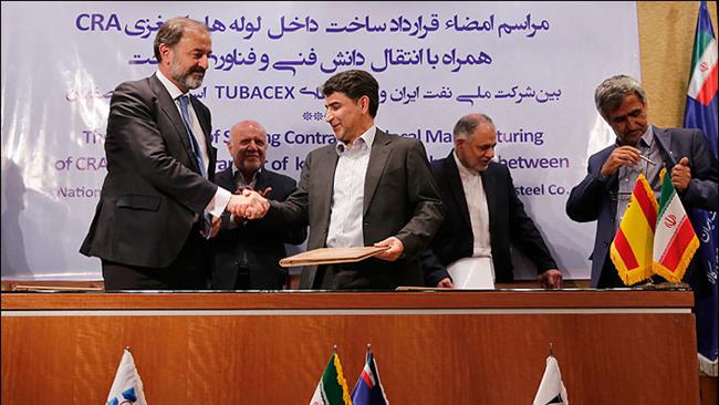 Iran inks first major oil deal after election