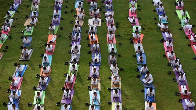 International Yoga Day marked by millions in India