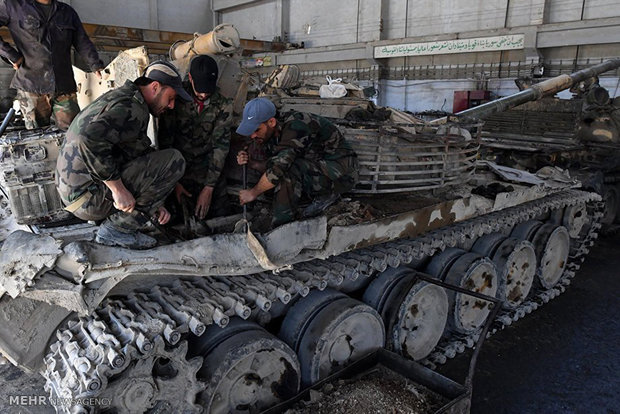 Repairing military equipment in Damascus