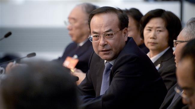 China’s ex-Politburo member charged with bribery