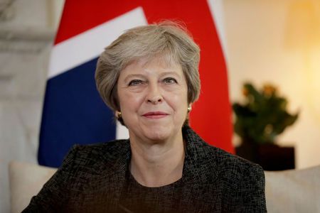 Britain's May says public should not be alarmed by medicines stockpiling