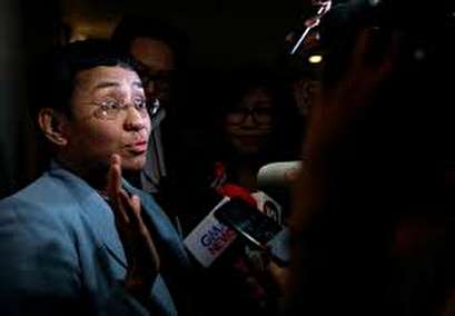 Philippine journalist at odds with Duterte arrested for libel