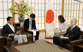 Japanese minister admonishes South Korea's envoy as row escalates
