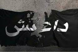 بازداشت یک تروریست داعشی ملبس به لباس زنانه + عکس