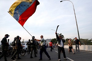 إسبانيا: نعارض أي انقلاب عسكير في فنزويلا وندعو لإجراء انتخابات