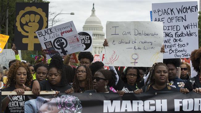 1000s march in Washington to demand racial justice amid NFL protests