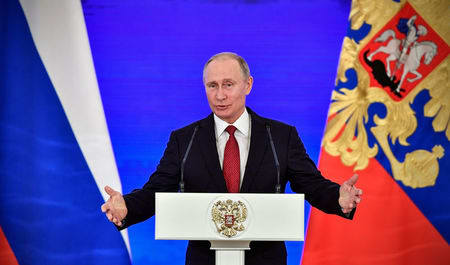 Putin says U.S. looking to stir trouble at upcoming Russian presidential vote: RIA