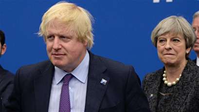 May shakes up cabinet in New Year reshuffle; Johnson survives