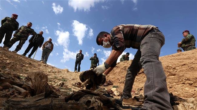Dozens of civilian bodies found in mass grave in Iraq’s Kirkuk Province
