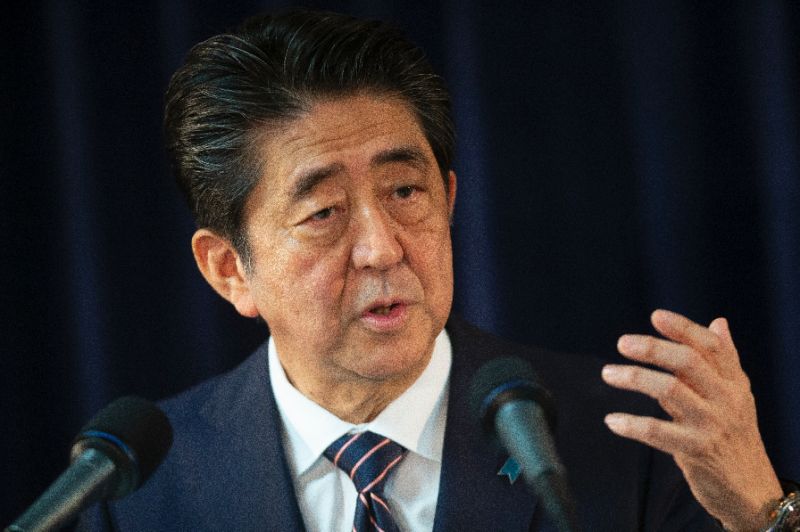 Japan working to arrange Abe-Kim talks: reports