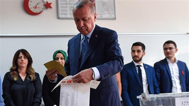 Erdogan casts vote in decisive general elections