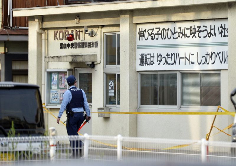Man kills policeman, guard in attacks near school in Japan