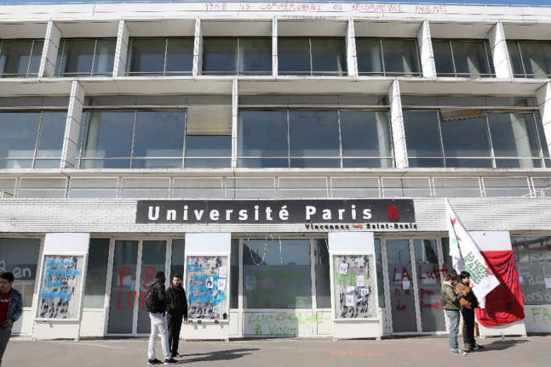 French police clear dozens of migrants from Paris university