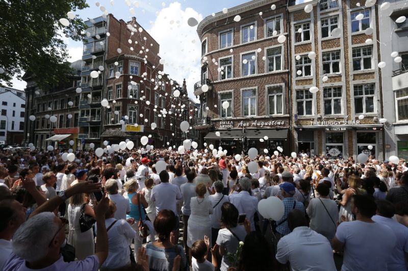 Thousands march for Belgium terror shooting victims