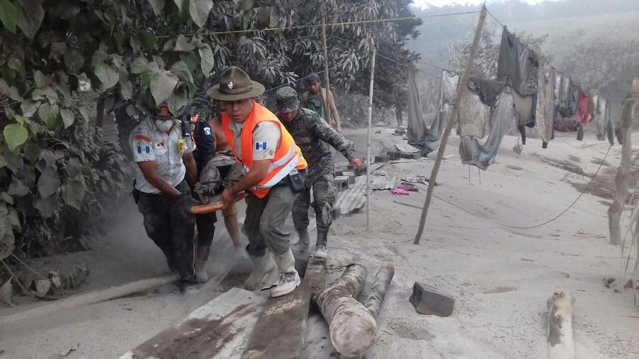 Guatemalan families continue search for victims after volcano eruption
