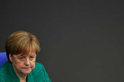 Merkel seeks to placate German rebels on migration