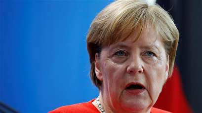 Merkel says she may support reduced EU tariffs on US car imports