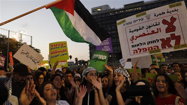 Arabs, Jews join Tel Aviv rally against ‘apartheid' law