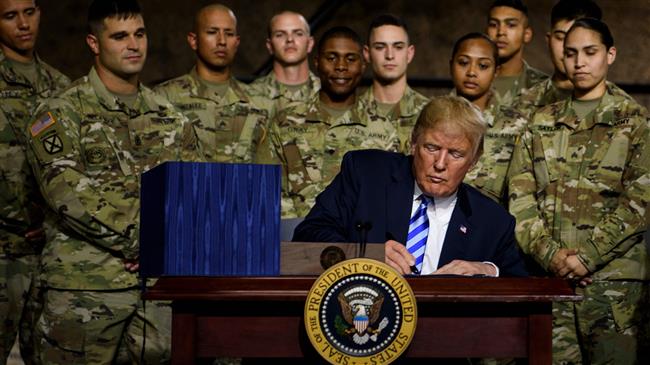 Trump signs $717bn US military budget into law; China, Russia prime targets
