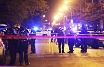 At least 40 shot and four killed in a night of Chicago gun violence