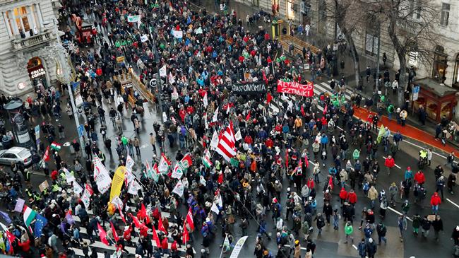 Thousands rally against Hungary’s overtime work law, PM Orban