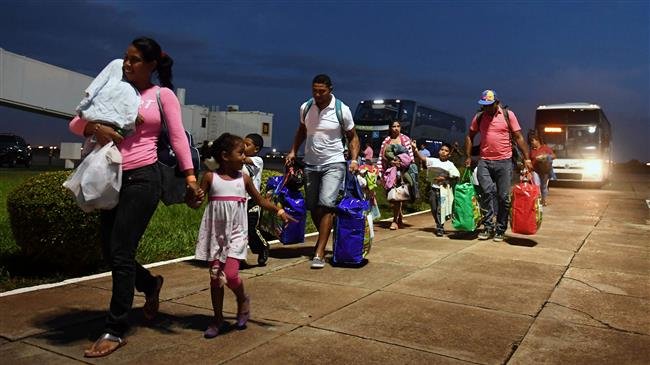 Brazil quits UN migration pact, will still take in Venezuelan refugees