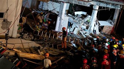 8 killed, dozens feared trapped after quake hits Philippines
