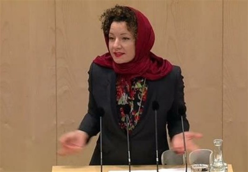 Austrian parliament member wears headscarf to protest hijab ban law