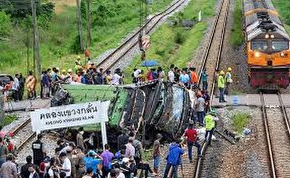 18 dead in Thailand bus-train collision