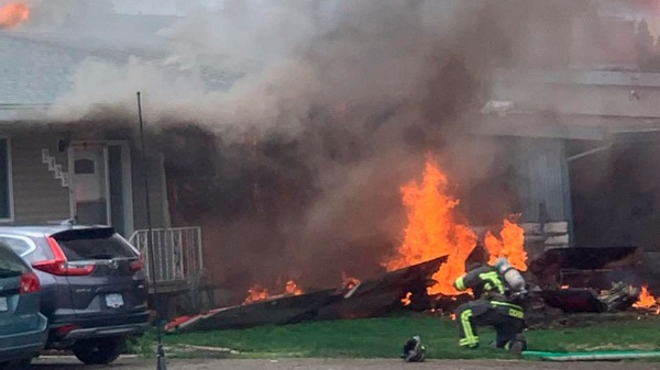 At Least One Killed in Bolivian Air Force Plane Crashes into Residential House