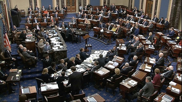 Senate approves sweeping coronavirus measure in partisan vote